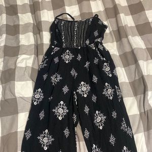Black with white pattern long legged romper